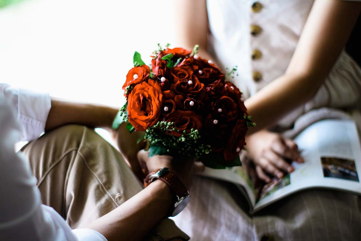 flower arrangement man holding red bouquet of flowers blossom